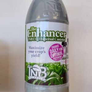 bottle of TNB naturals the enhancer CO2 on a wooden floor