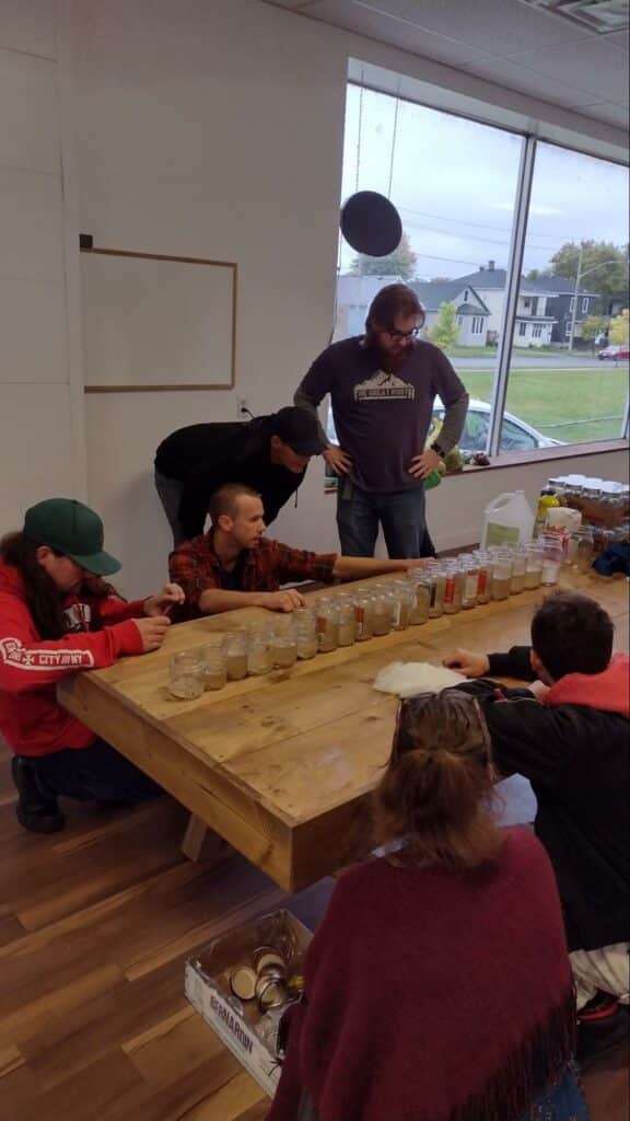 people looking at jars in the showroom